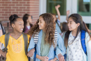 group of children talking with one another